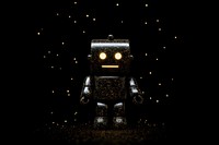 Robot shape sparkle light glitter night illuminated celebration.