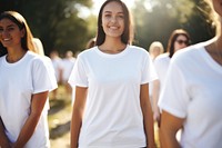 People group volunteer wearing blank white outdoors t-shirt sleeve.