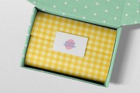 Green parcel box with yellow wrapping paper