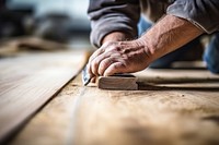 Carpenter making wooden flooring adult diy craftsperson.