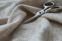 Anonym sartorial scissors cloth material textile blanket.