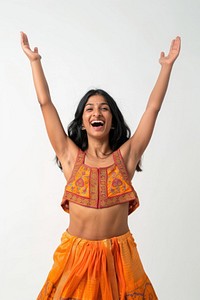 Excited indian woman raised her hands up dancing adult white background.