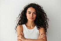 Radiant young woman with stunning curls who feels confident portrait adult photo.