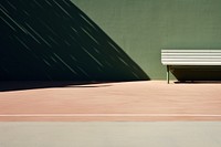 A tennis court outdoors architecture furniture.