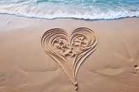 Simple drawing heart sand tranquility.