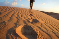 Person traveling person desert footprint.