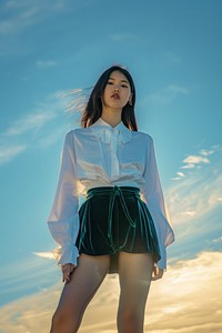 Asian woman blouse skirt beachwear.