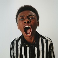 Black teenage boy yelling face shouting person.