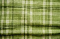 Green checkered linen texture tartan plaid.