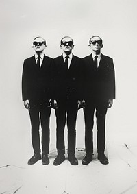 A four cool man wearing black suit and black sunglasses photography accessories accessory.