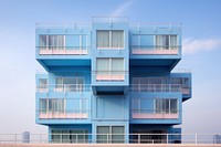 Navy pastel color minimal cube hotel in singapore architecture building balcony.