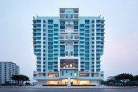Cyan pastel color minimal cube hotel in singapore architecture building city.