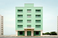 Green pastel color minimal cube hotel in singapore architecture building city.