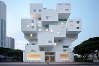 White contemporary minimal cube hotel in singapore architecture building city.
