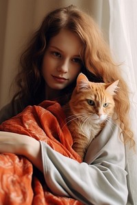 A girl cuddle with orange cat portrait mammal animal.