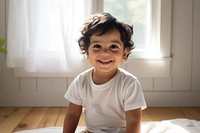 A happy indian toddler at home portrait smile child.