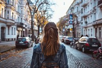 Woman travel at Berlin street vehicle city road.