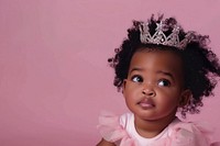 African american girl toddler wear a crown portrait tiara photo.