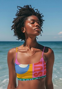 Black woman wearing colorful bikini
