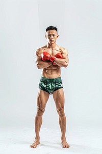 Fullbody Thai boxing pose stand in front of studio clothing apparel person.