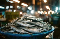 Fish market in Thailand herring sardine person.