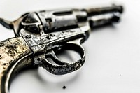 Vintage gun weaponry firearm handgun.