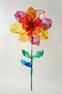 Flower made from plastic handicraft blossom origami.