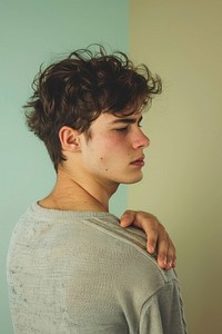 Young man having shoulder pain person human adult.