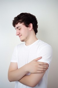 Young man having shoulder pain photo photography portrait.