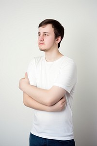 Young man having shoulder pain photo photography clothing.