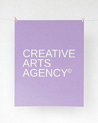 Purple poster hanging on rope