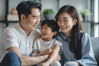 Happy asian family sit together adult togetherness affectionate.
