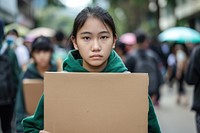South east asian teenager wear green photo electronics photography.