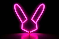 Pastel neon rabbit face light sign illuminated.