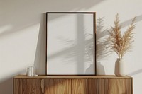 Blank framed photo mockup cabinet furniture painting.