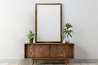 Blank framed photo mockup cabinet wood furniture.