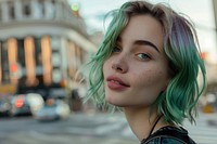 White woman green blunt lob hairstyles street individuality contemplation.