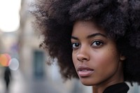 Black woman afro hairstyles street background portrait adult photo.