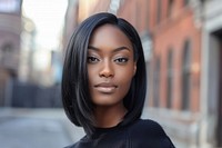 Black woman sleek shoulder cut hairstyles adult individuality contemplation.