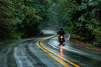 Motorcycle on road outdoors vehicle helmet.