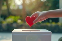 White donation box symbol love heart symbol.
