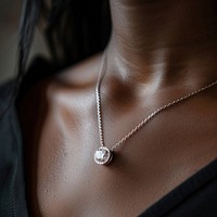 Photo of diamond necklace jewelry pendant locket.