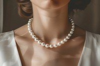 Photo of pearl necklace jewelry luxury accessories.