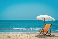 Photo of beach chair sea furniture umbrella.