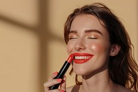 Photo of smilee woman lipstick cosmetics person.