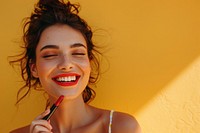 Photo of smilee woman lipstick cosmetics person.
