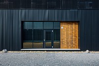 Photo of standalone warehouse building door architecture.