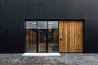 Photo of standalone warehouse door building wood.