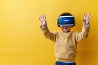 Boy wearing VR glasses technology happiness gesturing.