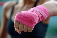 Boxing pink hand wraps finger exercising recovery.